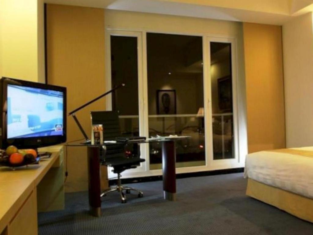 Sintesa Peninsula Hotel Manado Exterior foto